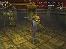 A ragged man engages in sword combat with a haunted suit of armor. The octagonal room is dim with crimson walls and a wooden checkered floor, and is adorned by a golden door, two stone gargoyles, and another suit of armor.