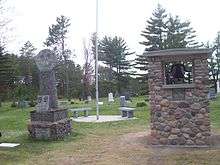 Photograph of cemetery bell tower.