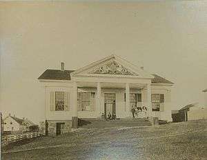 Sepia photograph of the Charlotte County Court House in 1895