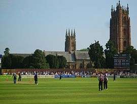 The County Ground, Taunton, with two churches visible in the background.