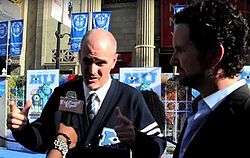 Writer Dan Gerson describes writing the film Monsters University at the premiere in 2013, with his writing partner Robert Baird on the right. Interview made by Mingle Media; the interviewer is Linda Antwi.
