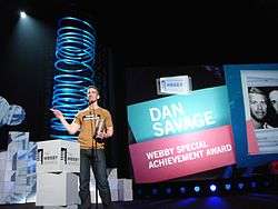 Dan Savage receiving the Webby Award