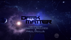 Against a space field lit by stars, the words Dark Matter in dark purple uppercase lettering.