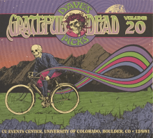 A skeleton dressed in old-fashioned clothes rides a bicycle on the grass. In the background are Boulder's Flatirons and the moon.