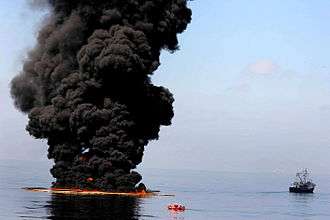 Controlled burn of oil on the ocean.