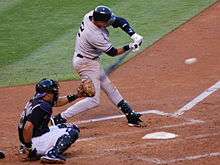 Derek Jeter swings at a pitch