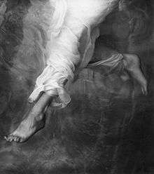 A black-and-white photograph symbolizing a descending angel.