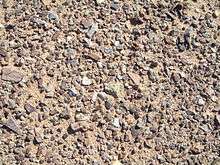 photograph of desert pavement, small stones left behind by wind