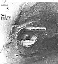 Large floods of water likely eroded the channels around the crater. (Lunae Palus quadrangle)