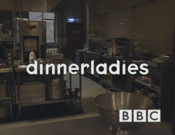 The BBC logo and the text "dinnerladies" in a rounded white font overlaid on the image of a darkened canteen.