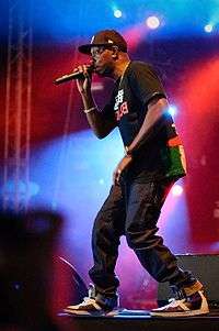 Dizzee Rascal performing on stage