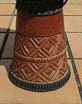Timing belt decoration on the foot of a djembe (purchased in Conakry in 2001)