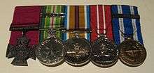 Five medals with their ribbons and clasps, including the Victoria Cross for Australia
