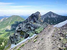 A photo from a trail on Agassiz Peak looking towards Doyle and Fremont peaks in summer