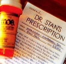 A plastic pill bottle labeled "moe.", and a medical prescription with the album title and song list