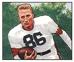Dub Jones running with a football, as pictured on a 1950 Bowman card