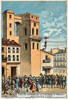 A man leaping from a tower.