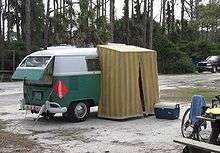 VW bus with attached small tent