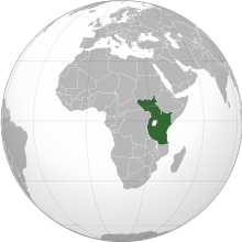 An orthographic projection of the world, highlighting the proposed East African Federation's territory (green).