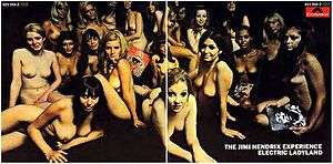 A color photograph of a record sleeve featuring an image of several naked women
