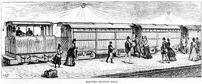 Illustration of a train of three carriages and a small locomotive waiting at a below ground platform; passengers in Victorian dress are boarding the train