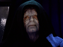 Screenshot of Emperor Palpatine, in his black hood, from Return of the Jedi