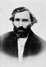 black-and-white photo of Eugene Skinner, a bearded man