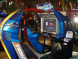 A blue sit-down arcade cabinet stylized in the shape of one of the game's hovercrafts.