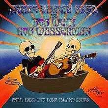 Two skeletons sit in a small boat, with the rays of the setting sun behind them.  One skeleton is wearing sunglasses, a black t-shirt, and dark pants, and playing an electric guitar.  The other is wearing a sleeveless t-shirt and shorts, and playing an acoustic guitar.
