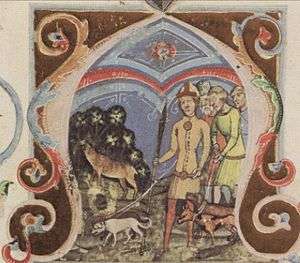 Four men, one of the leading three dogs, in pursuit of a deer