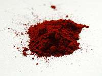 Sample of dark red powder