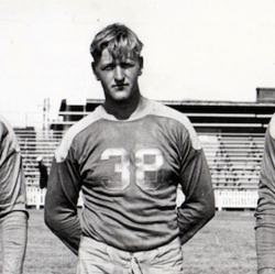 A picture of Frank Kosikowski outside in a football uniform in 1945