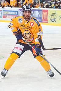 Frans Nielsen skating with his hockey stick as a Rauman Lukko team member.