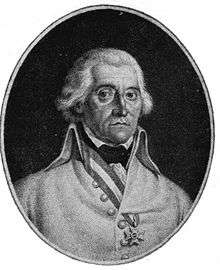 Black and white print of a man with round eyes and white hair. He wears a white military uniform with a single decoration.
