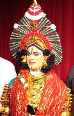 A yakshagana artist wearing pagaDe