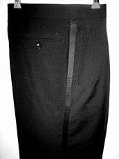 Black tie trousers with a side stripe.
