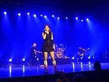 Garbage performing in a stage.