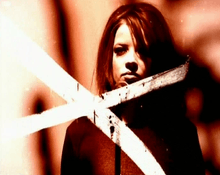 Shirley Manson in a scratched, bleached image.