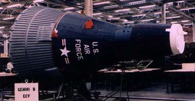 A spacecraft in a museum, displaying a United States Air Force color scheme