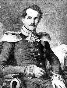 Friedrich von Röder in uniform sitting of a chair