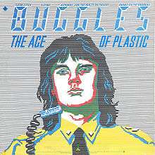 Cartoon version of Geoff Downes. On top of it is the blue text "Buggles The Age of Plastic," as well the names of the tracks included on side two of the album.