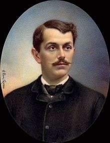 Painted portrait of mustachioed man with in a black coat and bow-tie
