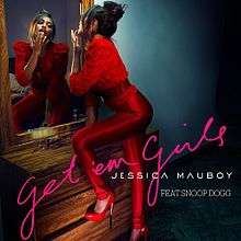 A black background and a green floor and a orange little wardrobe and the red woman. Performer is 'JESSICA MAUBOY FEAT. SNOOP DOGG' and pink word is 'get' em girls'