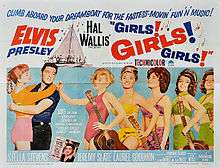 Film poster with Presley on the left, holding a young woman around the waist, her arms draped over his shoulders. To the right, five young women wearing bathing suits and holding guitars stand in a row. The one in front taps Presley on the shoulder. Along with title and credits is the tagline "Climb aboard your dreamboat for the fastest-movin' fun 'n' music!"