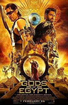 Against a backdrop of Egyptian pyramids, an ensemble cast of Egyptian gods and humans on differing scales pose.