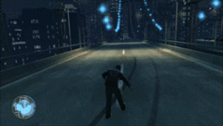 Player character Niko walks down a road while intoxicated, followed by driving in a car while intoxicated. In both scenes, the gameplay vision is blurred and shaky.
