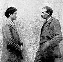 Duncan Grant and John Maynard Keynes photographed facing each other c.1913.