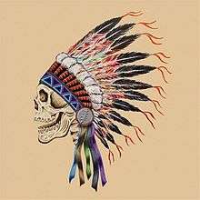 A skull wearing a Native American headdress