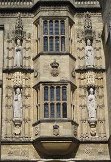 Oriel windows with statues