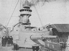 A large turret with two guns on a warship